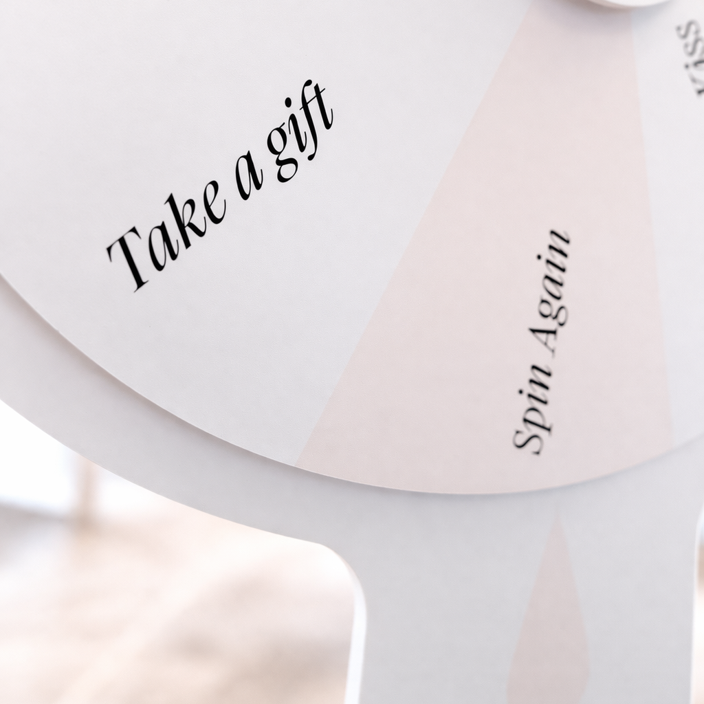 a close-up of a white object with the text "Take a gift" written on it.