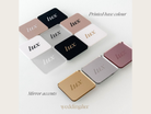 various colored square mirrors with the word "Lux" printed on them, along with text indicating the base color and the type of the mirrors as wedding accessories.