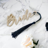 Beige Cut Out Luxury Place Names With Tassel