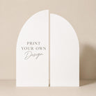 a white arch with the text "Print your own design" written on it.