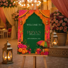 a colorful sign with a floral design and decorative elements, welcoming guests to a special event.